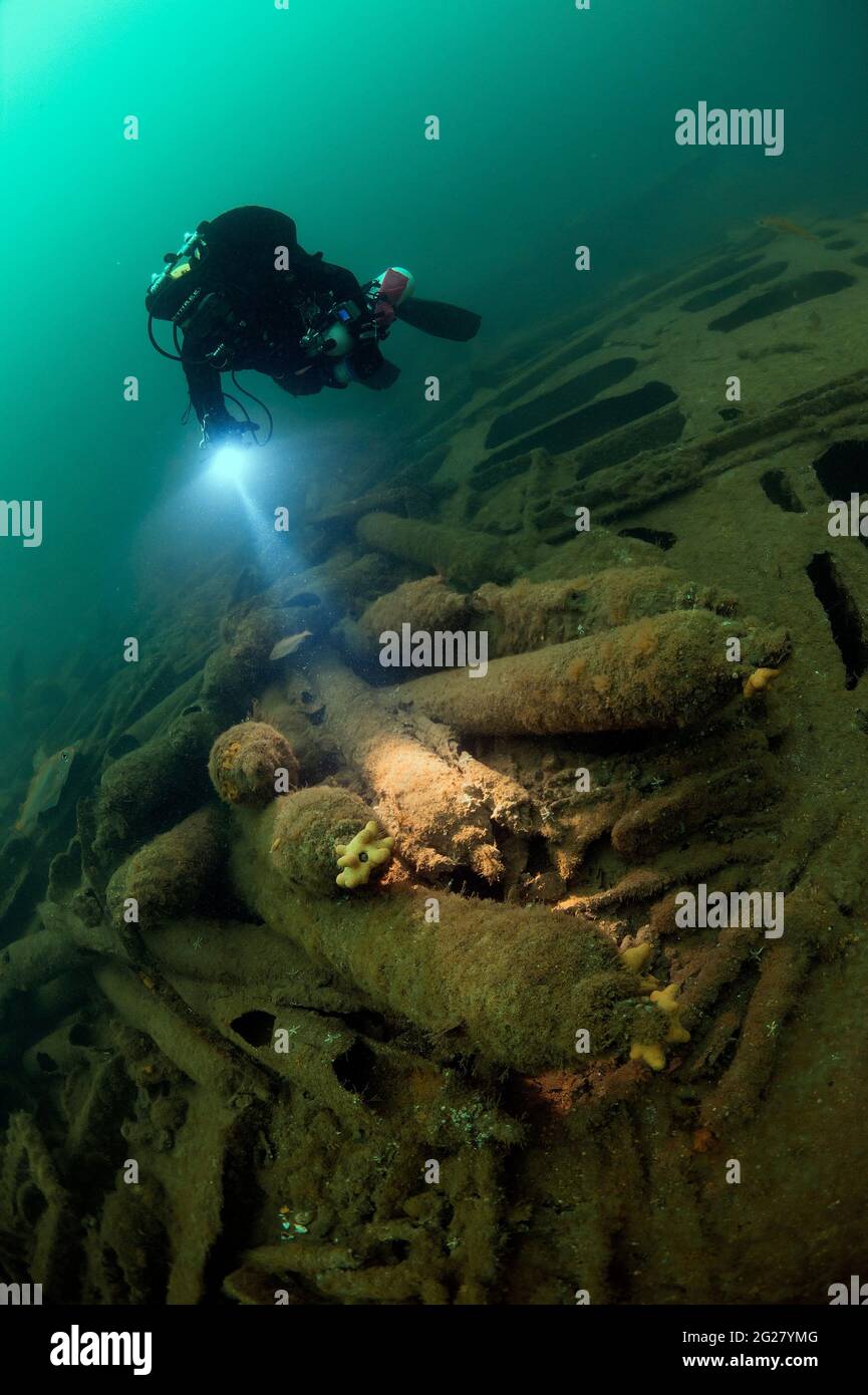 Diver exploring the wreck of the SS Laurentic ocean liner sunk during WW1. Stock Photo
