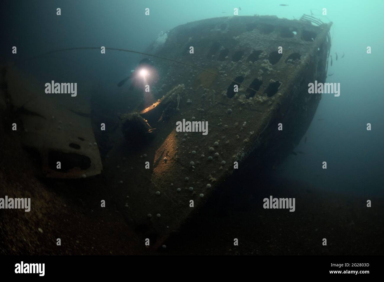 Diver exploring the RMS Justicia shipwreck off Malin Head, Ireland. Stock Photo