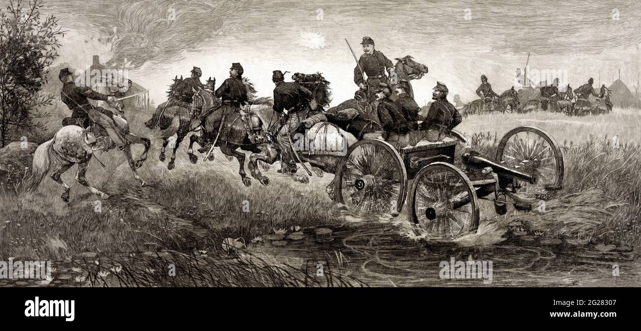 Men riding on a caisson towing a small cannon during the Battle of Chancellorsville. Stock Photo