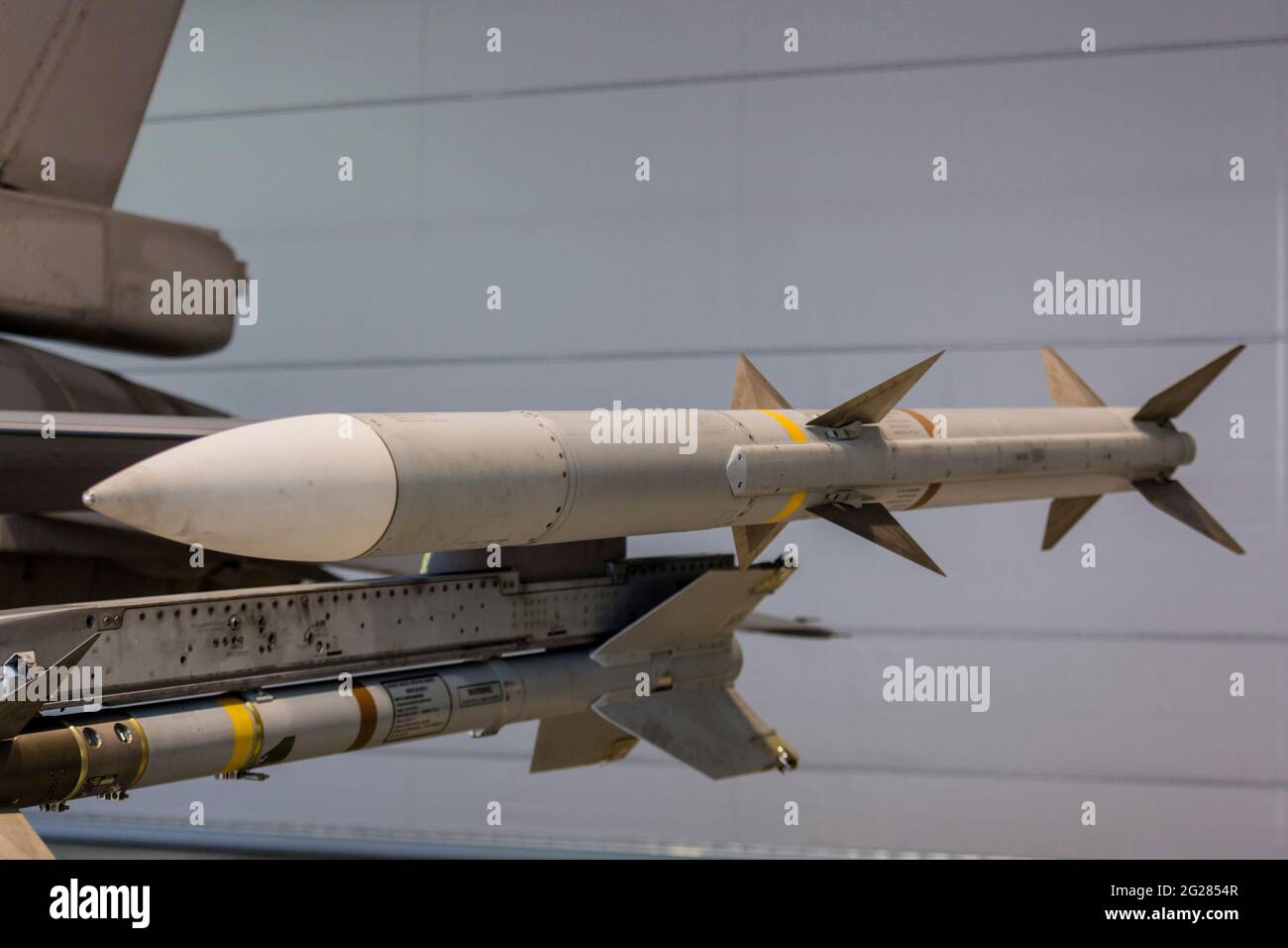Live AIM-120 AMRAAM missile on a F-16 jet. Stock Photo