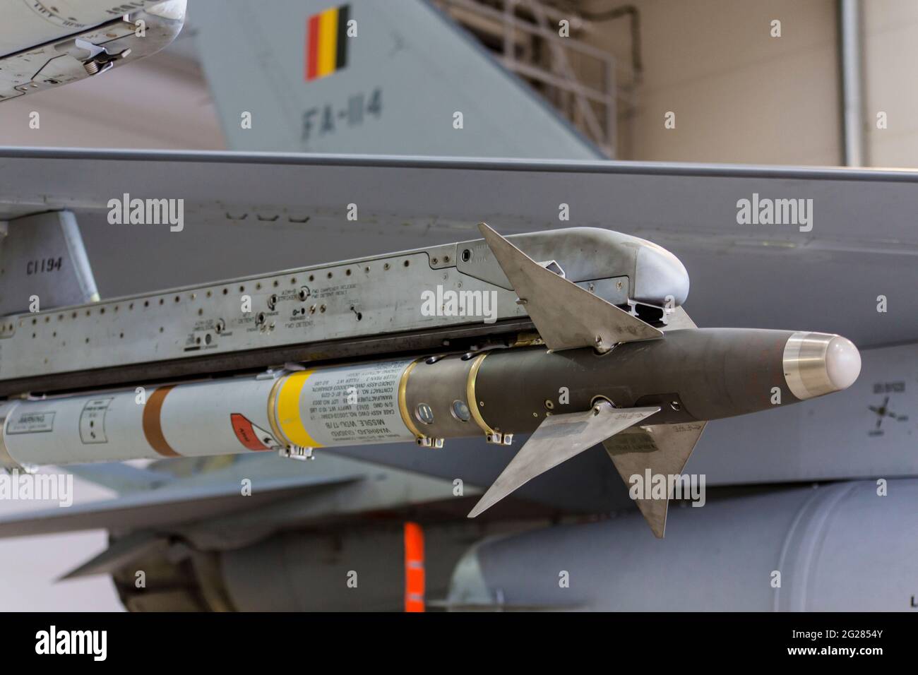 Live AIM-9M missile on a Belgian F-16 jet. Stock Photo