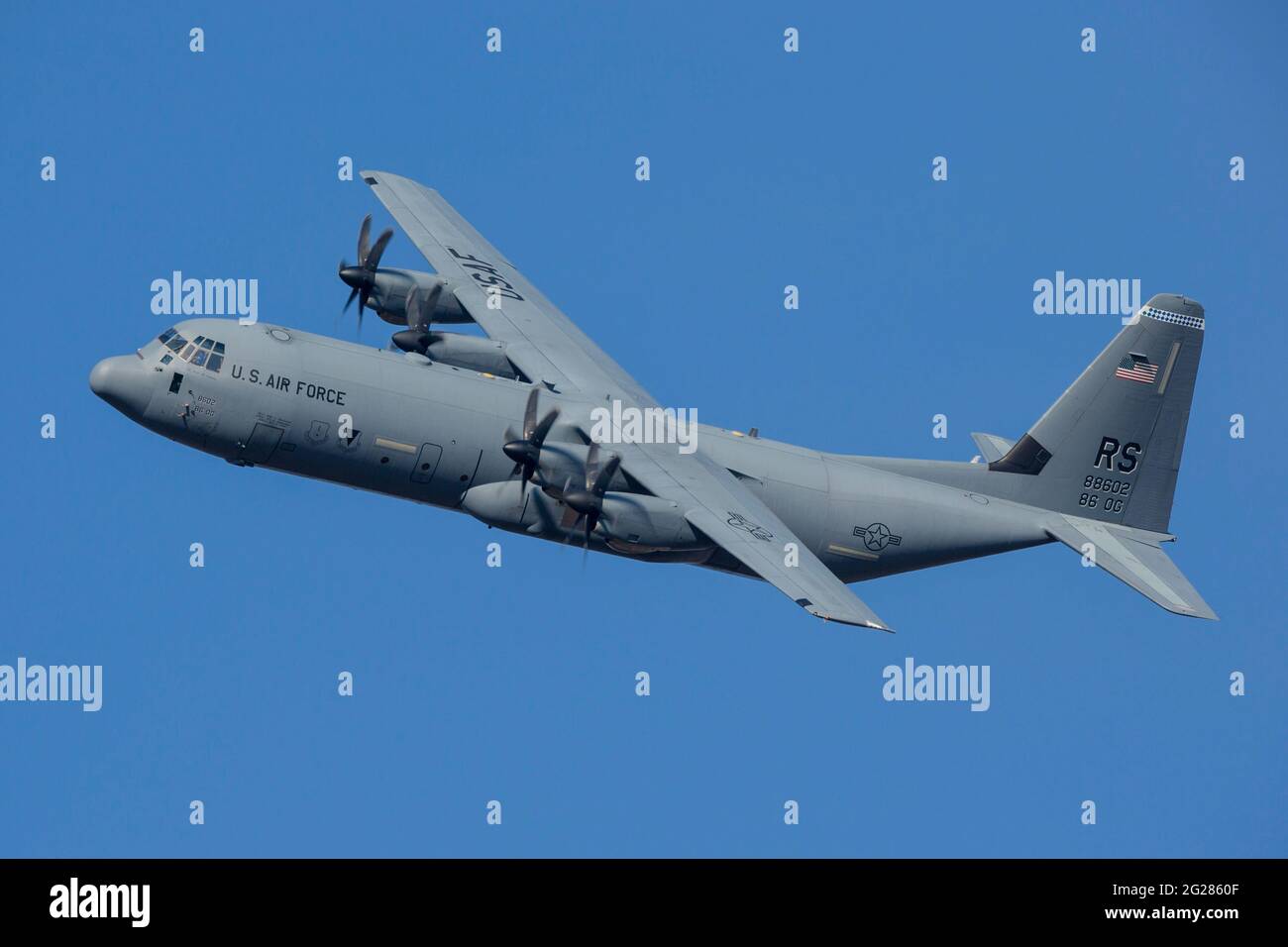 U.S. Air Force C-130J of the 86th Airlift wing overhead Ramstein Air Base, Germany. Stock Photo
