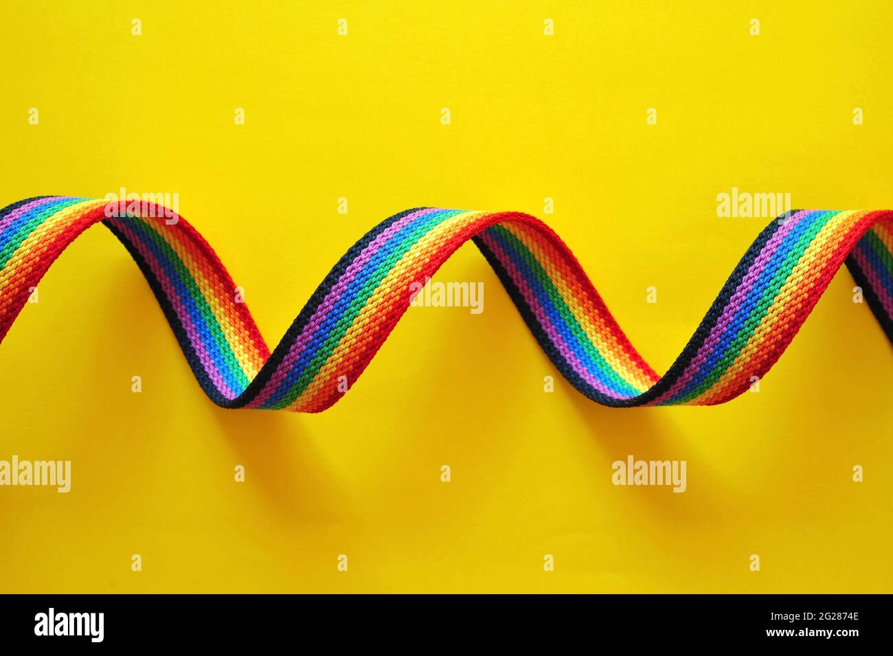 Gay pride design elements: rainbow ribbon. LGBT, gay and lesbian pride symbols. LGBT concept. Stock Photo