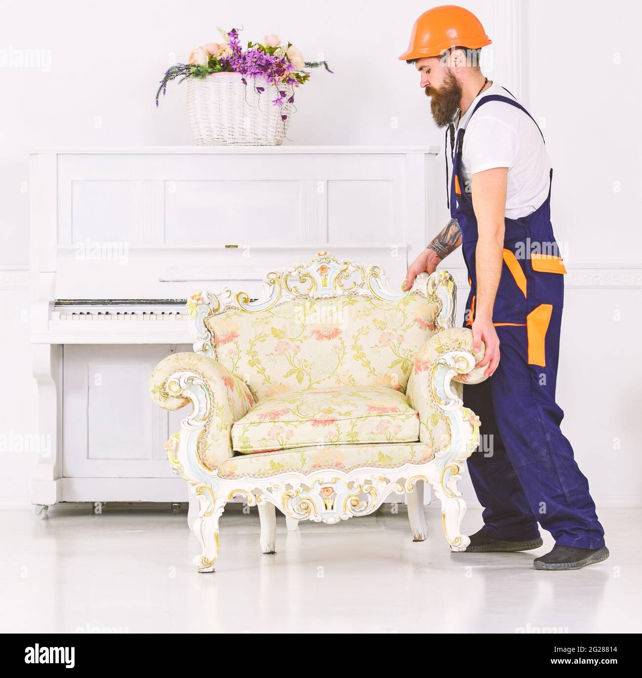 Courier delivers furniture in case of move out, relocation. Man with