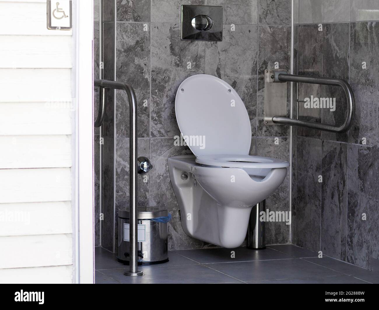 bathroom with handrails for disabled peoples Stock Photo Alamy