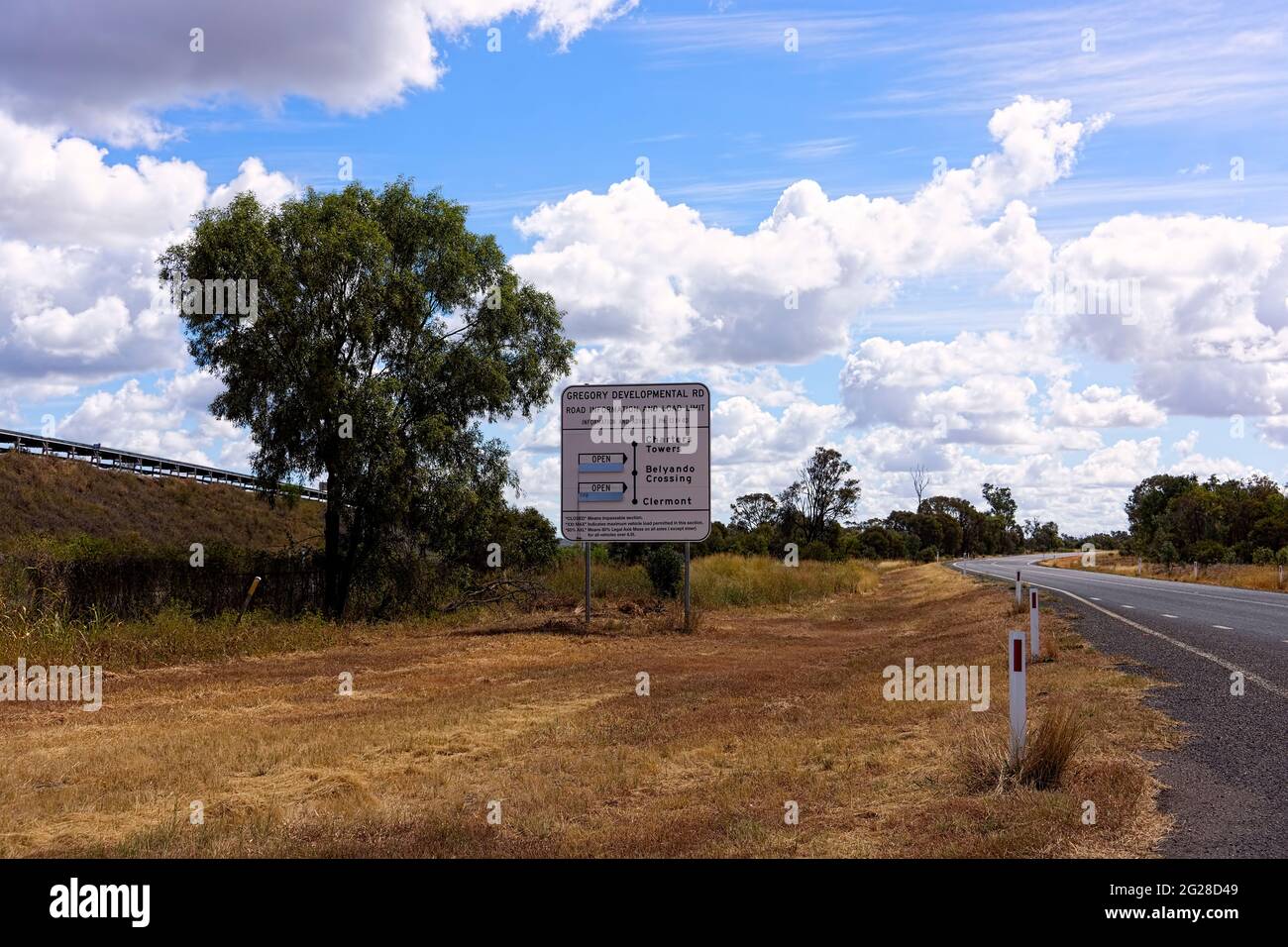 Sign in remote outback Queensland indicating road conditions and load