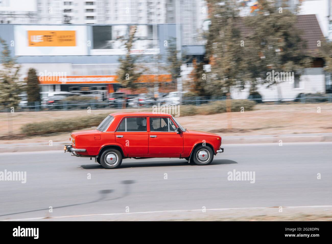 Ukraine, Kyiv - 13 May 2021: Red LADA 2101 car moving on the street. Editorial Stock Photo