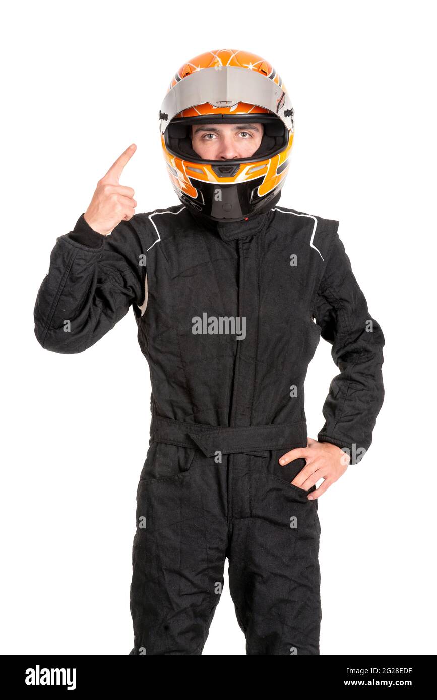 Victorious racing driver posing with helmet isolated in white Stock Photo