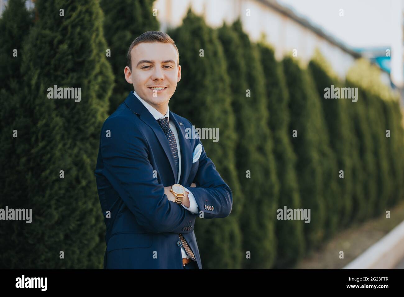 Caucasian young businessman in suit and tie standing outdoor Stock ...