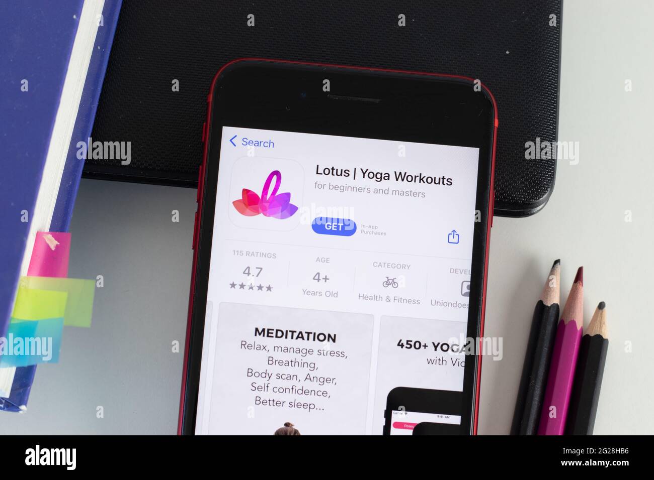 New York, USA - 1 June 2021: Lotus Yoga Workouts mobile app logo on phone screen, close-up icon, Illustrative Editorial Stock Photo