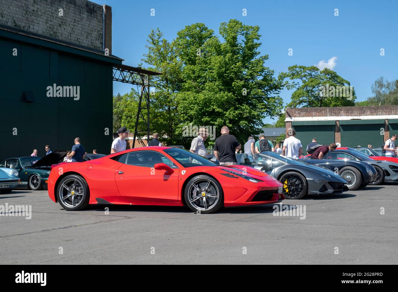 Red Ferrari at the summer Bicester Heritage Centre sunday scramble event. Oxfordshire, England Stock Photo