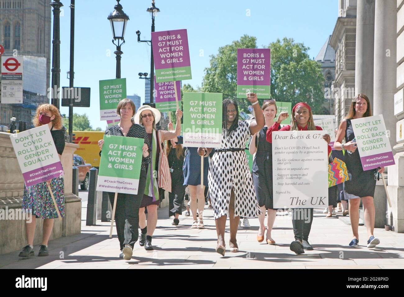 A group of women’s rights champions including Jess Phillips MP (second left) Helen Pankhurst (third left) Shadow Women's and Equality Secretary Marsha de Cordova (centre) and Shola Mos-Shogbamimu (second right) before joining a group of women's rights champions in delivering a public letter to 10 Downing Street as part of a Wednesday4Women day of action, calling on the UK Government to halt the roll-back of gender equality by a generation ahead of the G7 summit. Picture date: Wednesday June 9, 2021. Stock Photo