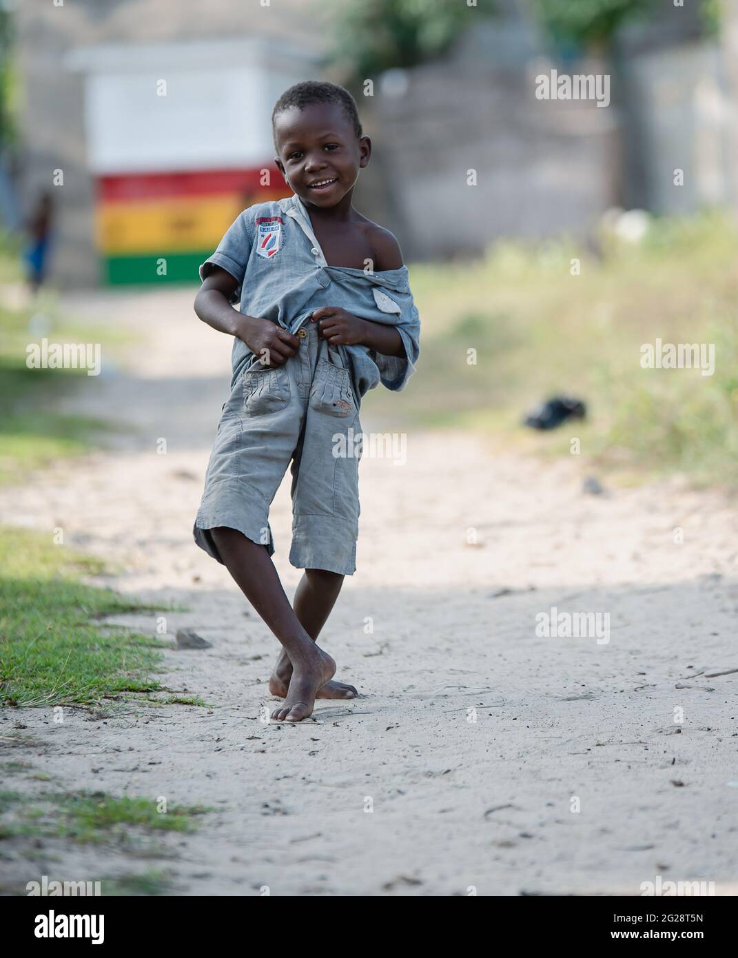 An African boy from the fishing people poses with joy in front of the  camera in the tropical beautiful fishing village in Keta Ghana West Africa  2020 Stock Photo - Alamy