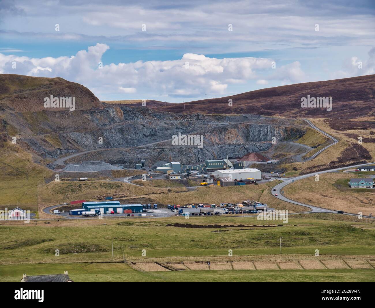 Scord Quarry near Scalloway. The quarry produces 100,000 tonnes of metamorphic schist used for aggregate production including that for road surfacing. Stock Photo
