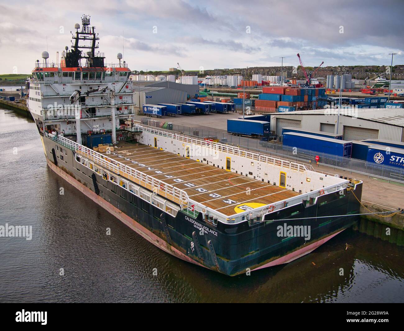 Caledonian Vigilence berthed in the port of Aberdeen, Scotland, UK - this ship is an Offshore Tug and Supply Ship built in 2006. Stock Photo
