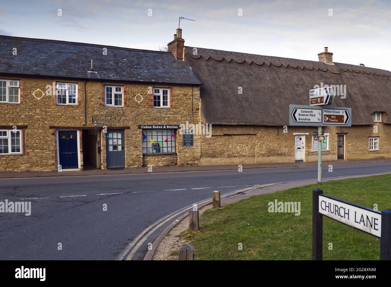 Shops and cottages on village green in Sharnbrook, Bedfordhire, England, UK Stock Photo