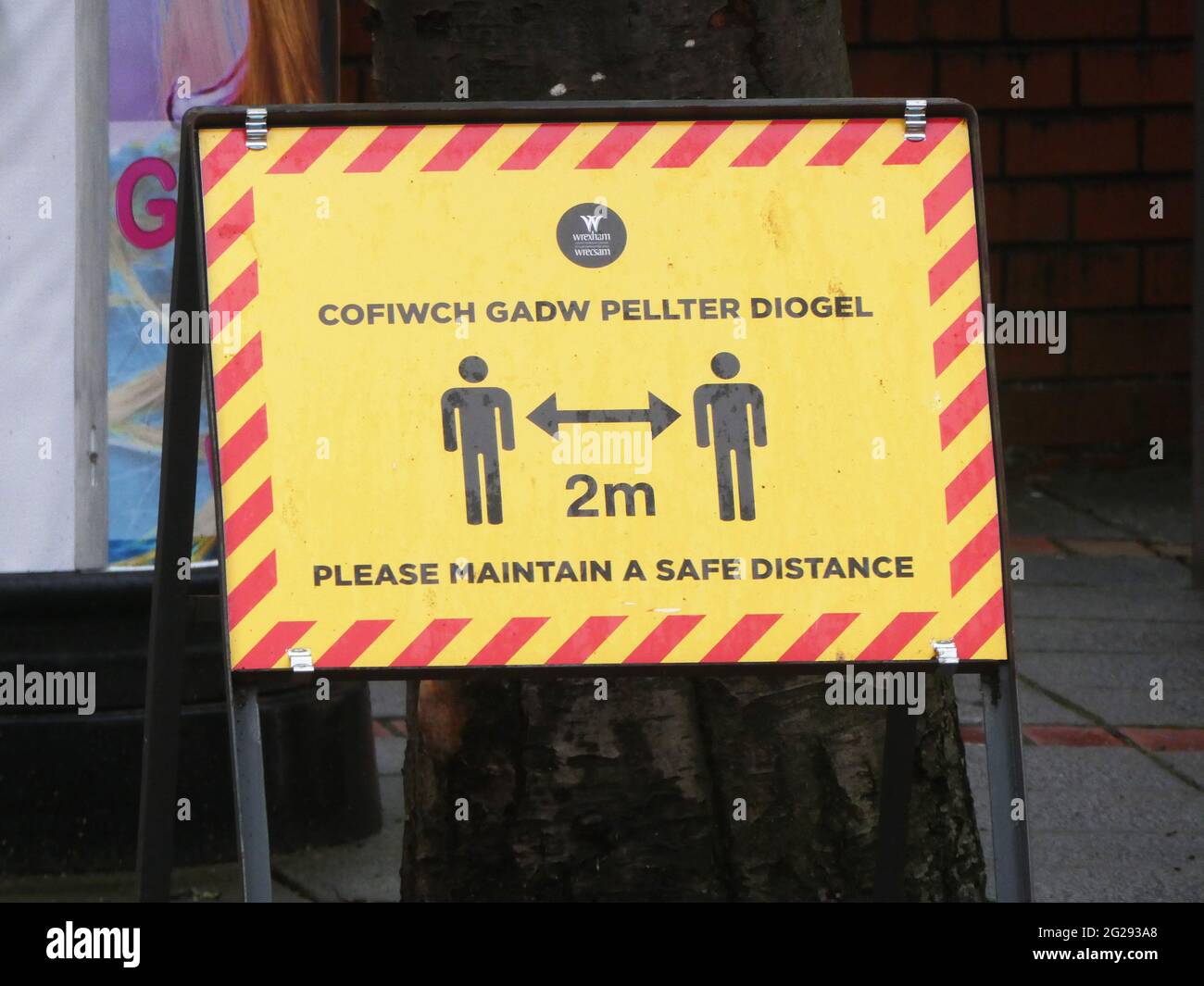 Coronavirus Covid 19 -  Warning signs in Wrexham town centre during the pandemic.  Social distancing sign Stock Photo