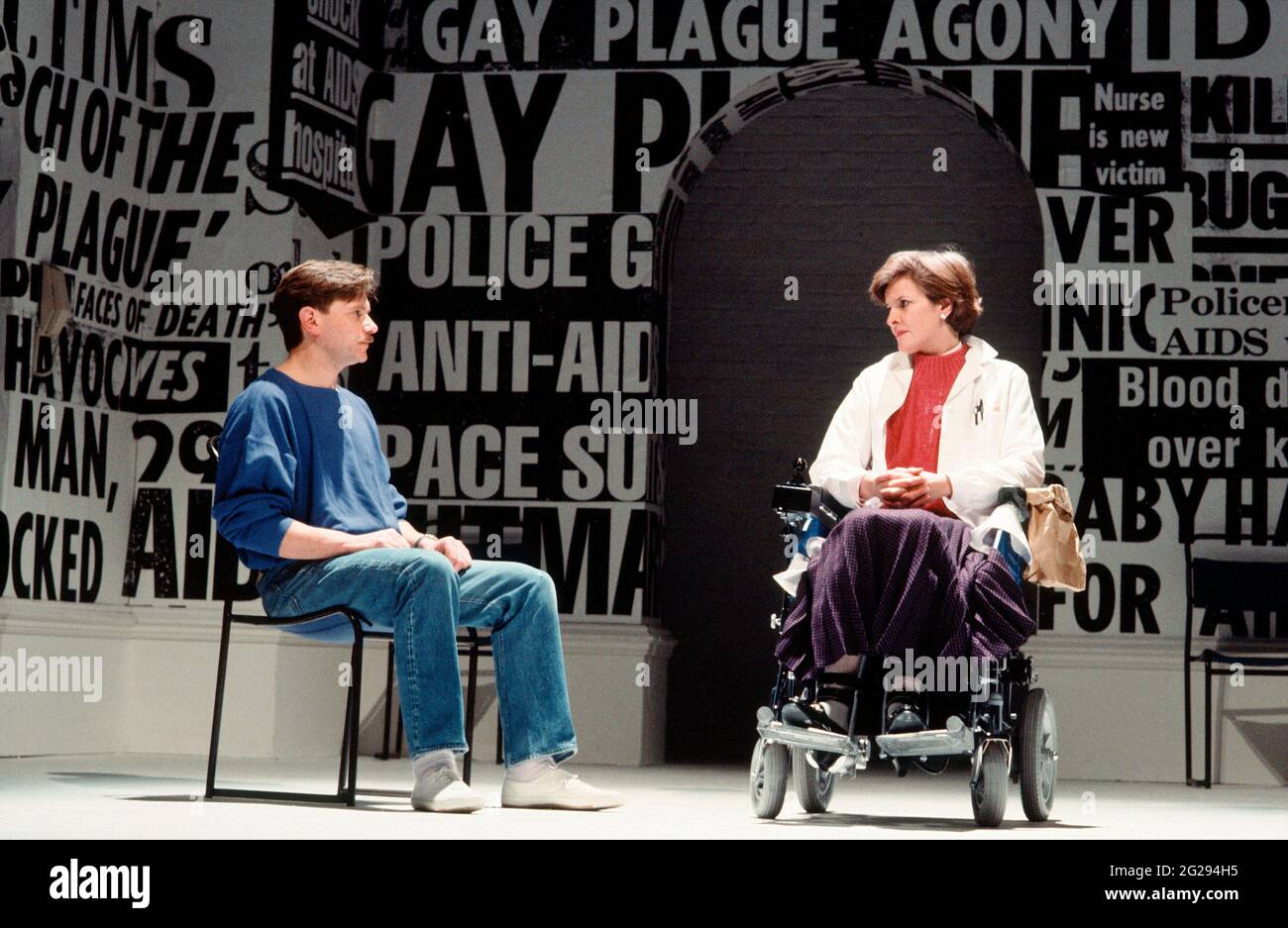 Paul Jesson (Felix Turner), Frances Tomelty (Dr Emma Brookner) in THE NORMAL HEART by Larry Kramer at the Royal Court Theatre, London SW1 20/03/1986  design: Geoff Rose  lighting: Gerry Jenkinson  director: David Hayman Stock Photo