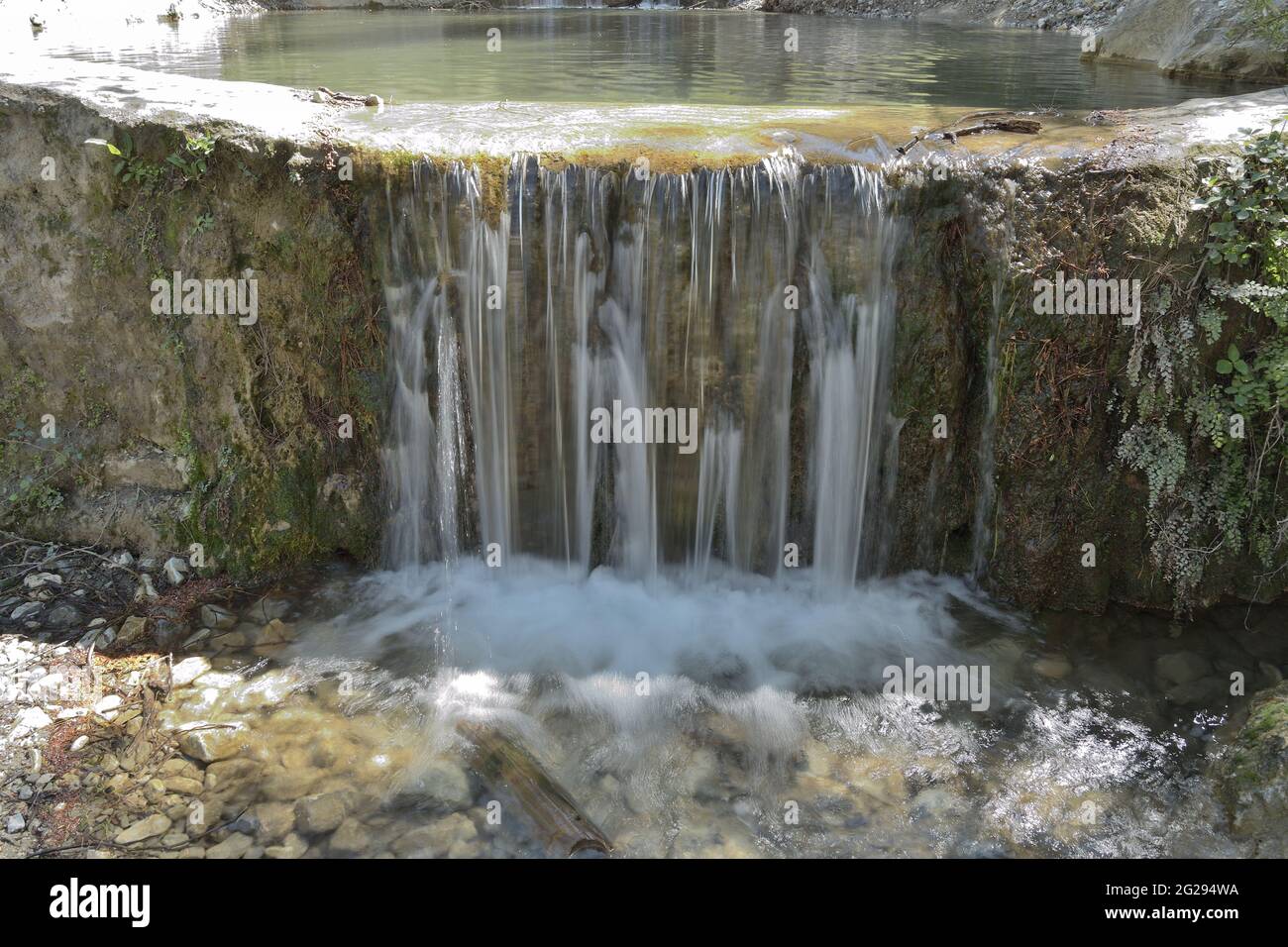 Water mountain running and falling in a little waterfall Stock Photo ...