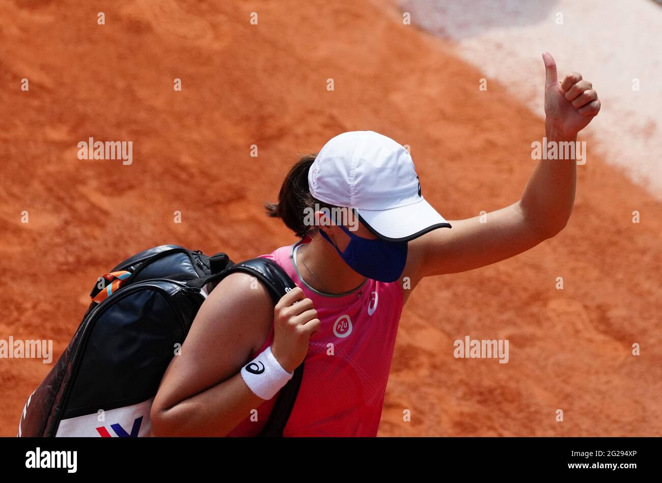 Paris, France. 9th June, 2021. Iga Swiatek of Poland leaves the court after the women's singles quarterfinal match between Maria Sakkari of Greece and Iga Swiatek of Poland at the French Open tennis tournament at Roland Garros in Paris, France, June 9, 2021. Credit: Gao Jing/Xinhua/Alamy Live News Stock Photo
