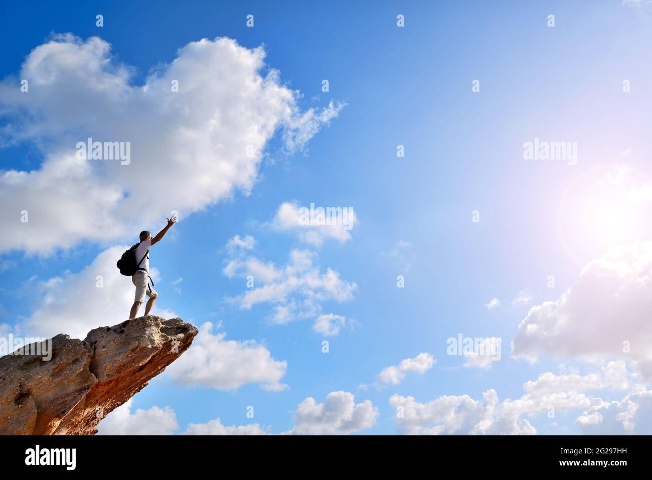 Silhouette man raising arms hi-res stock photography and images - Alamy