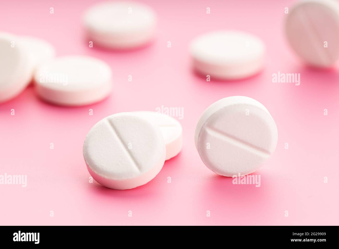 Group of Medicine pills on pink background. Medicine, healthcare and pharmacy concept Stock Photo