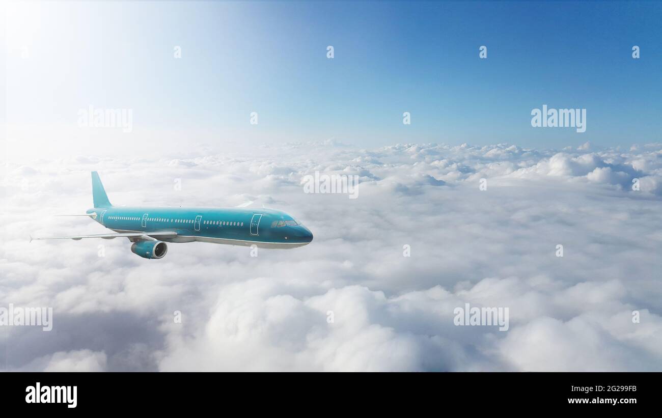 Commercial airplane flying above clouds Stock Photo - Alamy