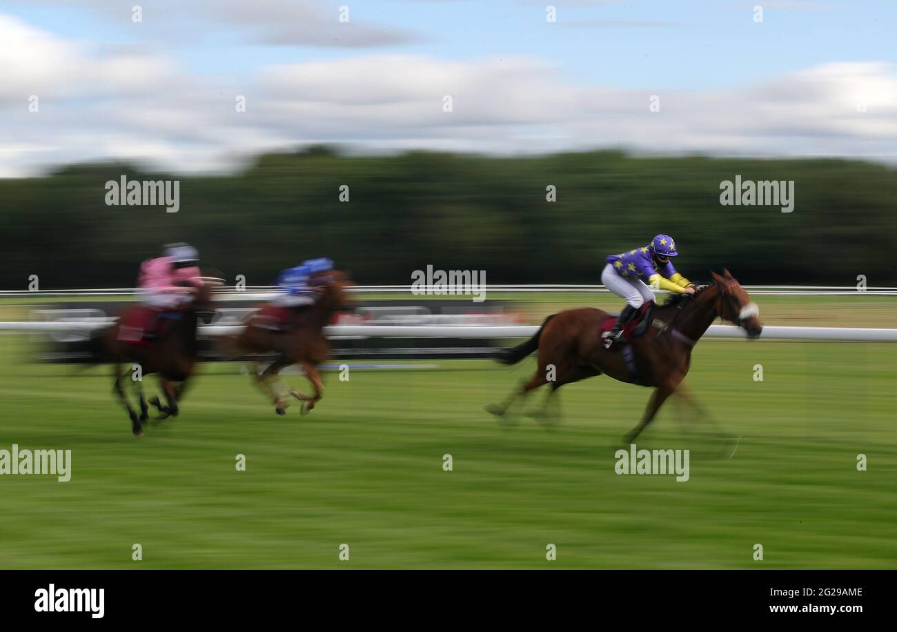 Erika Parkinson riding Eponina (right) on their way to winning the Haydock Park Apprentice Training Series Handicap at Haydock Park Racecourse in Newton-le-Willows, Merseyside. Picture date: Wednesday June 9, 2021. Stock Photo