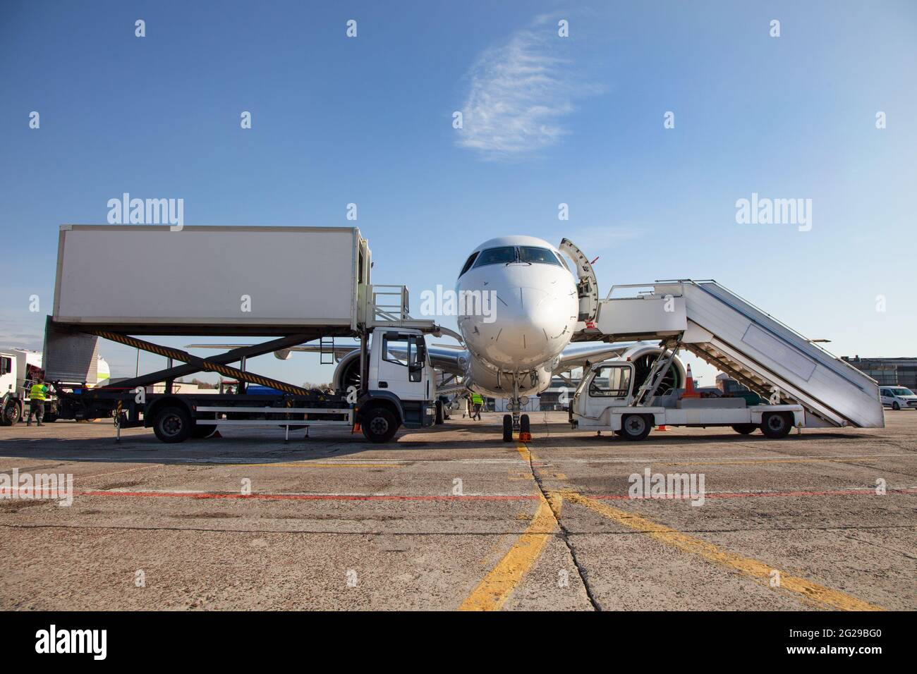 Handling and catering service. Boarding passengers on the plane ...