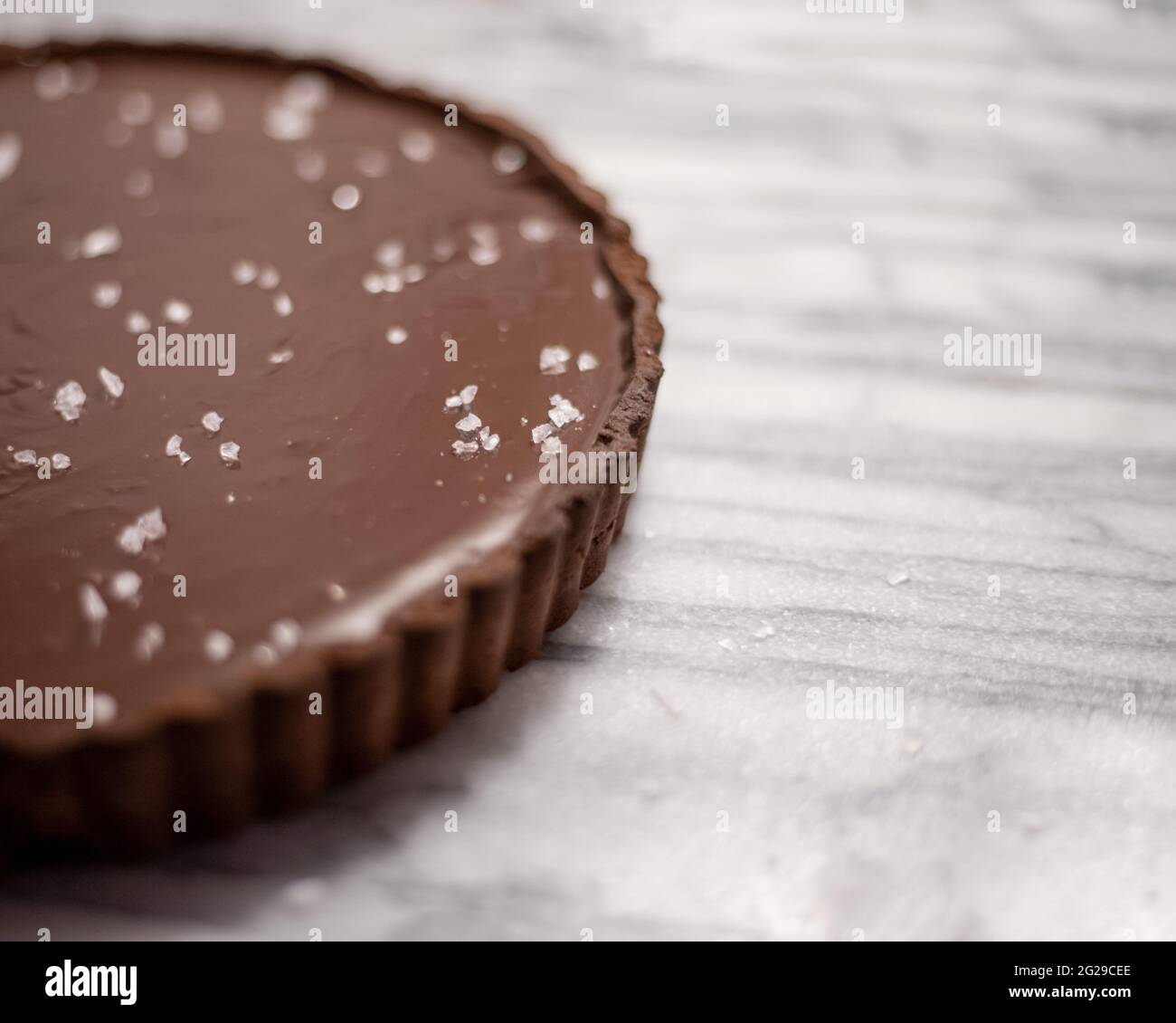 Dark Chocolate Ganache Salted Caramel Tart Stock Photo Alamy