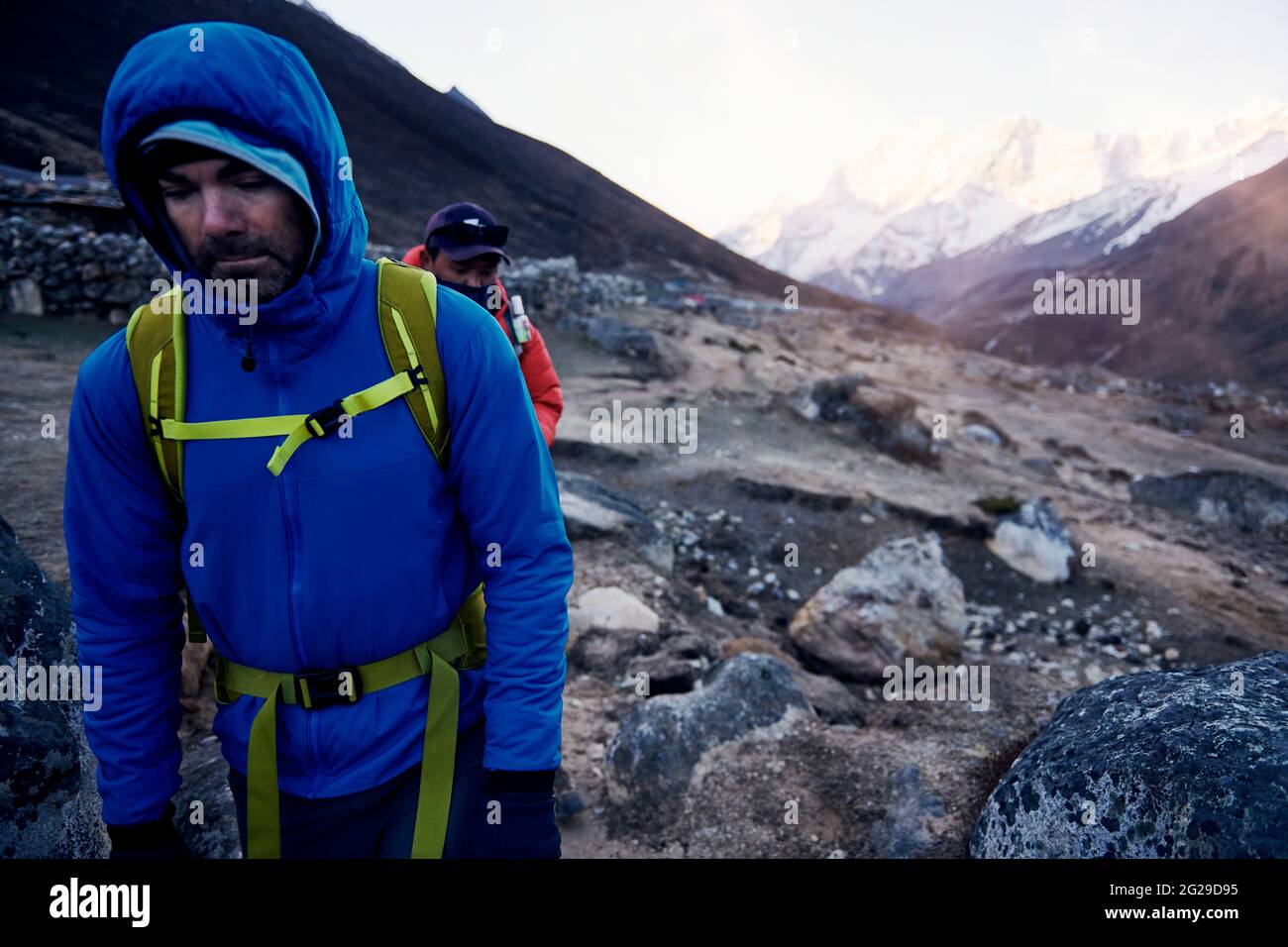 Trekkers on an early alpine start in Nepal Stock Photo