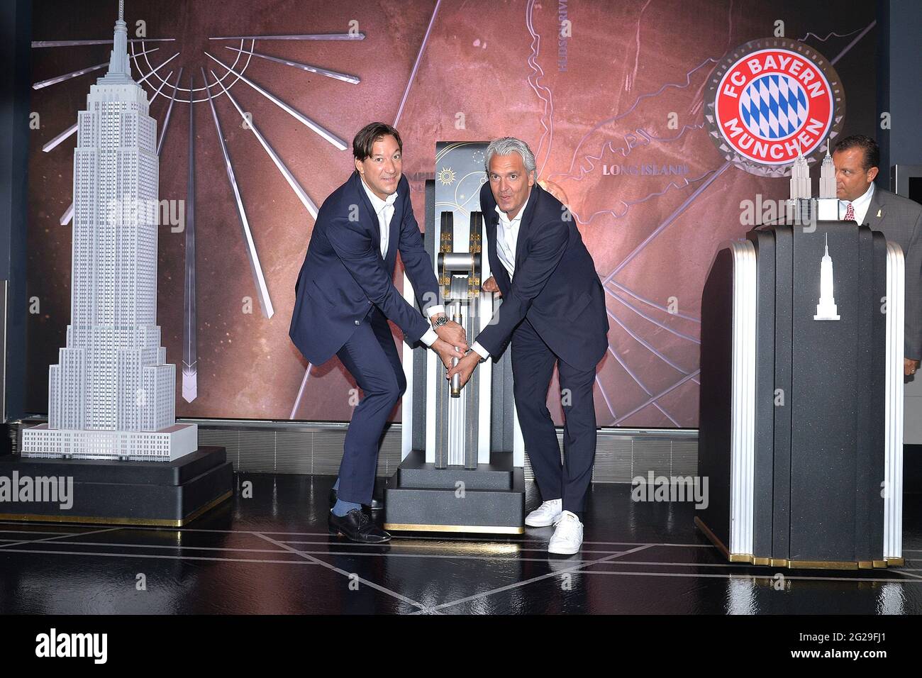 New York, USA. 09th June, 2021. (L-R) Rudolf Vidal, FC Bayern Munich, President - Americas and Joerg Wacker, FC Bayern Munich, Board Member for internationalization and strategy, from FC Bayern Munich, German professional soccer sports club, visit the Empire State Building for a special lighting ceremony in New York, NY, June 9, 2021. (Photo by Anthony Behar/Sipa USA) Credit: Sipa USA/Alamy Live News Stock Photo