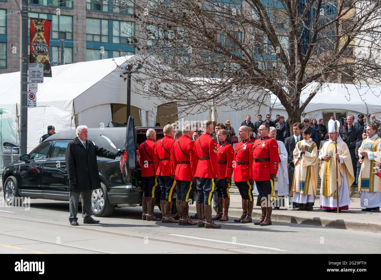 RCMP getting the Flaherty's coffin out and into the Cathedral for service. Scenes of the State Funeral for Jim Flaherty, former Minister of Finance of Stock Photo
