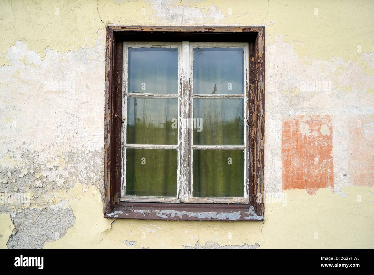 Old wooden frame and broken glass window on an old building for ...