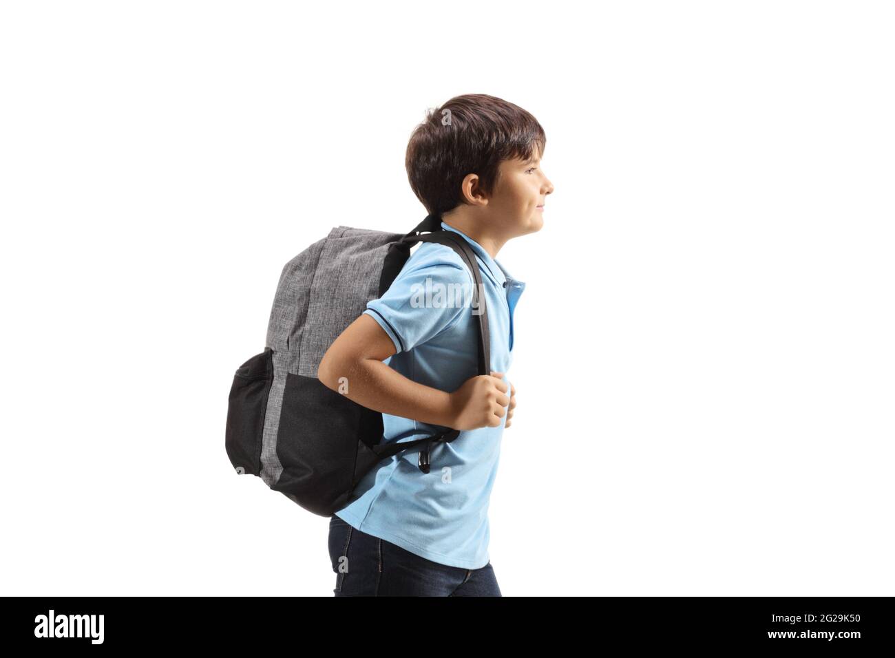 Profile shot of a schoolboy with a backpack isolated on white ...