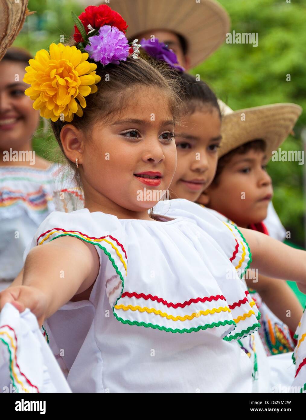 Beautiful child girl wearing traditional dress Toronto's Hispanic