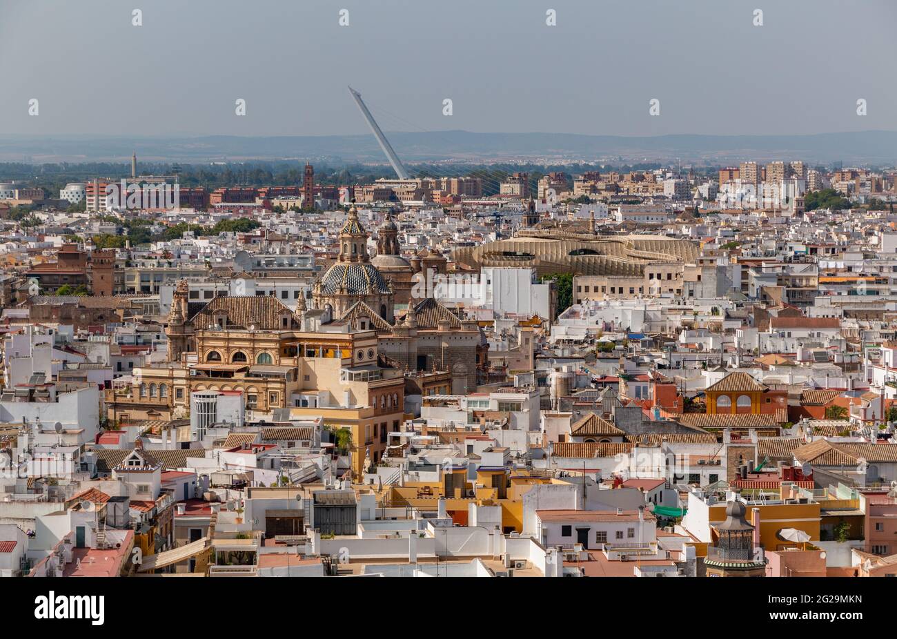 A picture of some landmarks of Seville as seen from above, such as the Metropol Parasol and The Church of the Divine Savior of Seville. Stock Photo