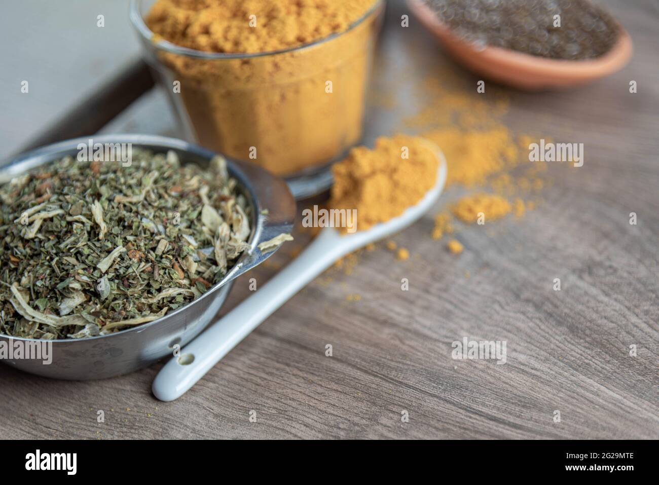 Various condiments for food preparation in selective focus. Brazilian