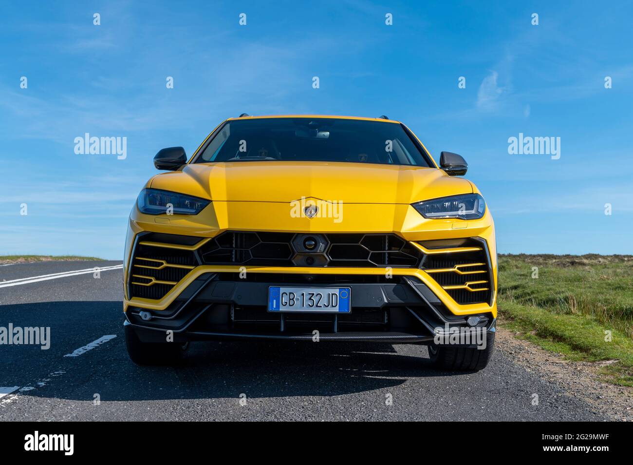 A Urus SUV photographed in the evening sunshine at