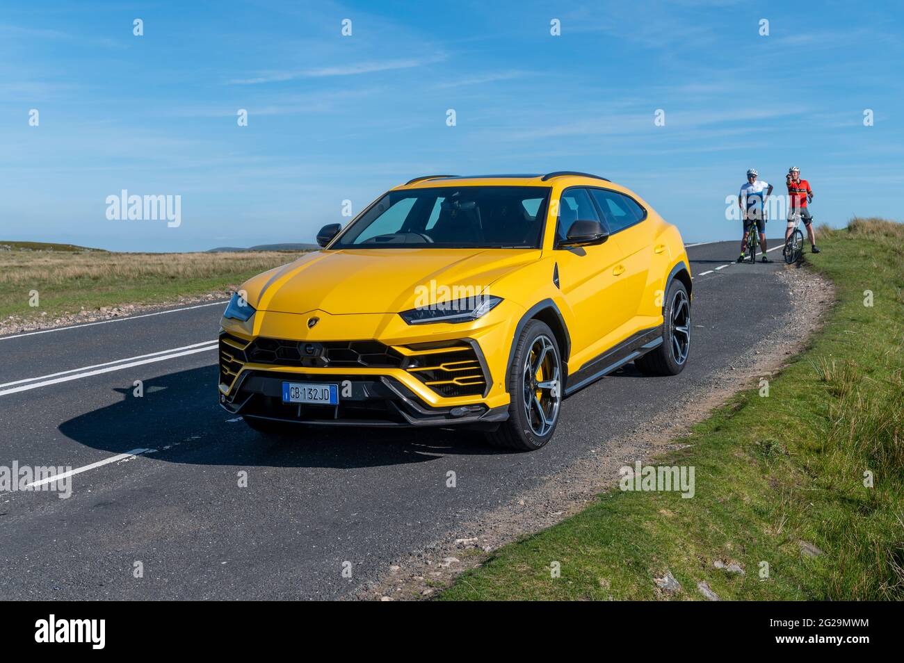 A Urus SUV photographed in the evening sunshine at