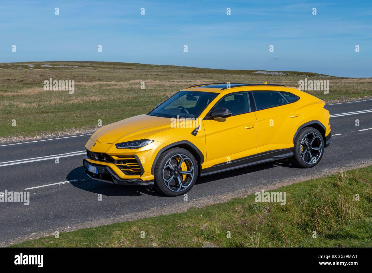 A Lamborghini Urus SUV photographed in the evening sunshine at Llangynidr, Powys, Wales, UK. Spec: 4 litre twin turbo V8 engine 0-62 mph 3.6 secs Top Stock Photo