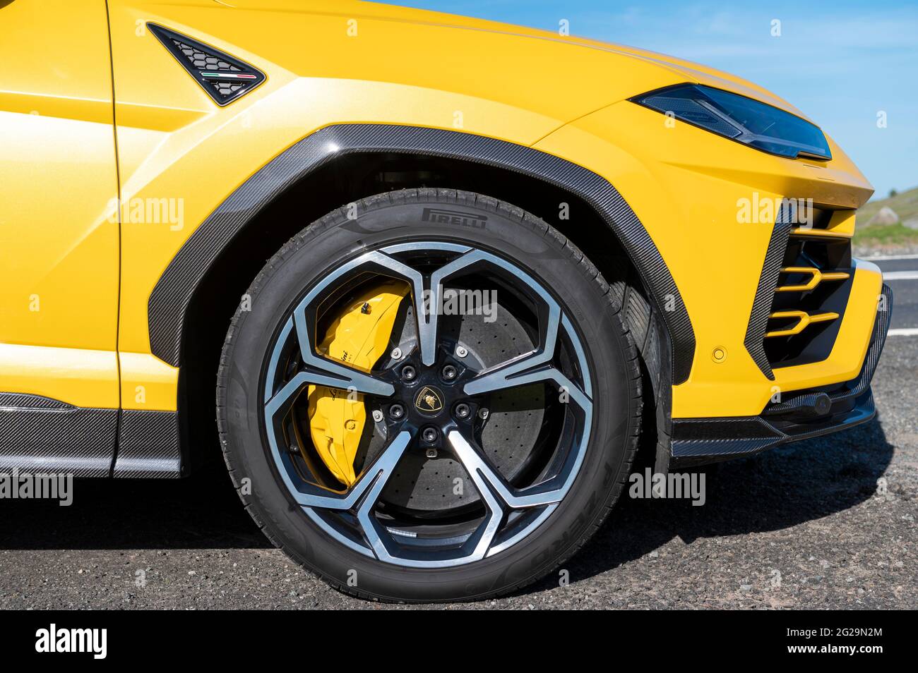 A Urus SUV photographed in the evening sunshine at