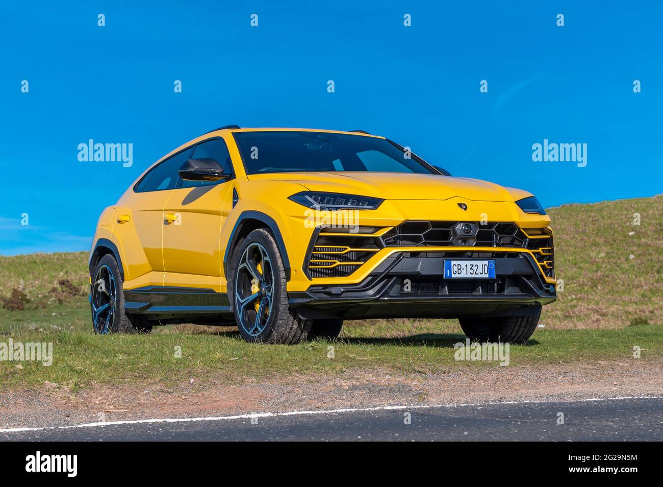 A Urus SUV photographed in the evening sunshine at