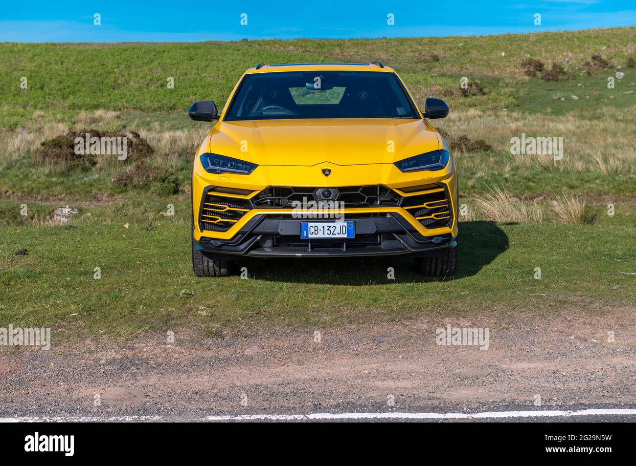A Urus SUV photographed in the evening sunshine at
