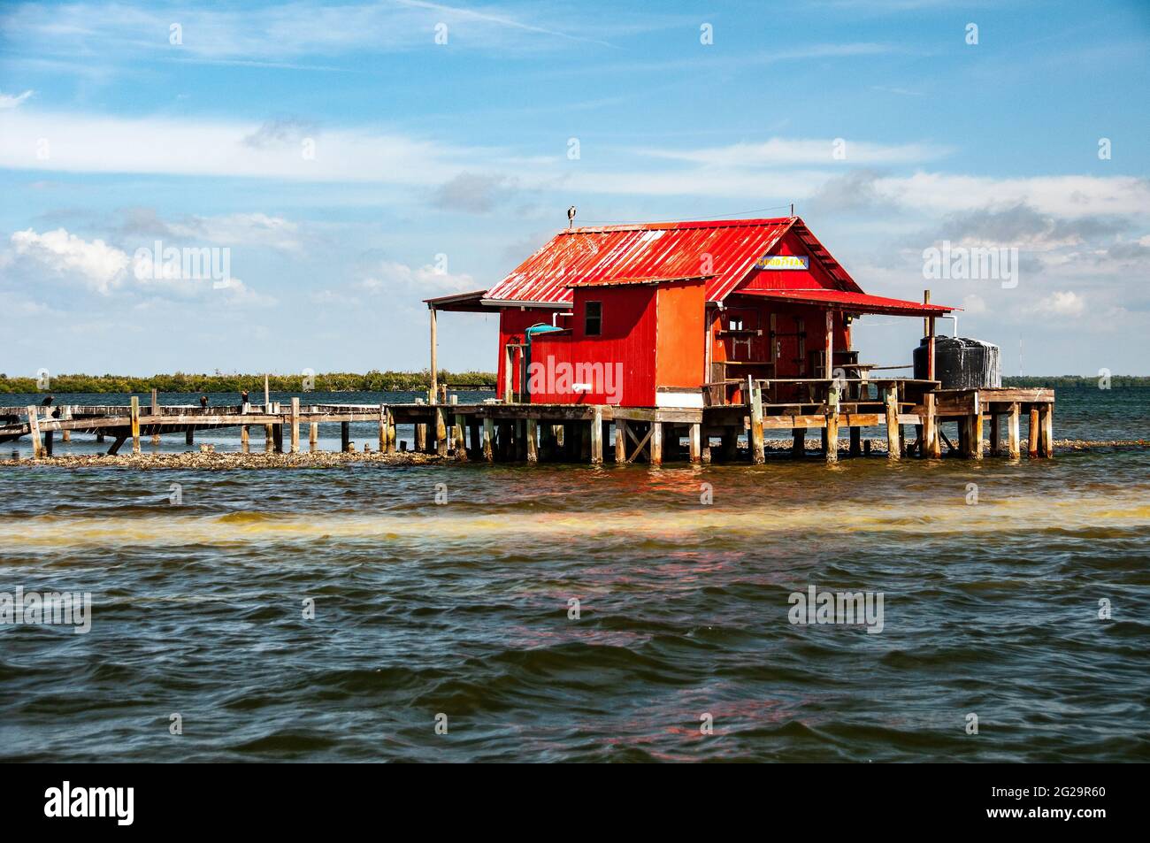 Red Florida stilt house, Pine Island Sound, Florida Stock Photo