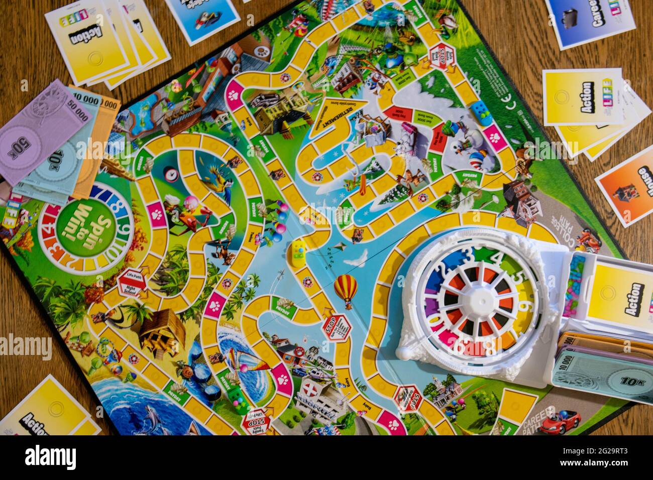 A view of The Game of Life (also known as LIFE), a board game originally  created in 1860 by MIlton Bradley Stock Photo - Alamy