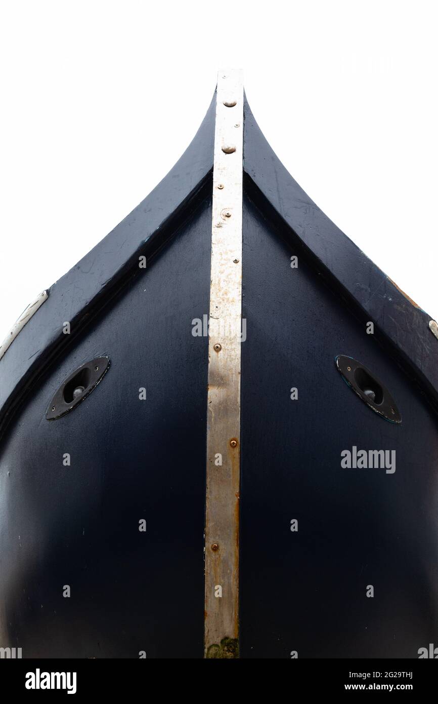 The detail of a gondola in Venice shows a face Stock Photo