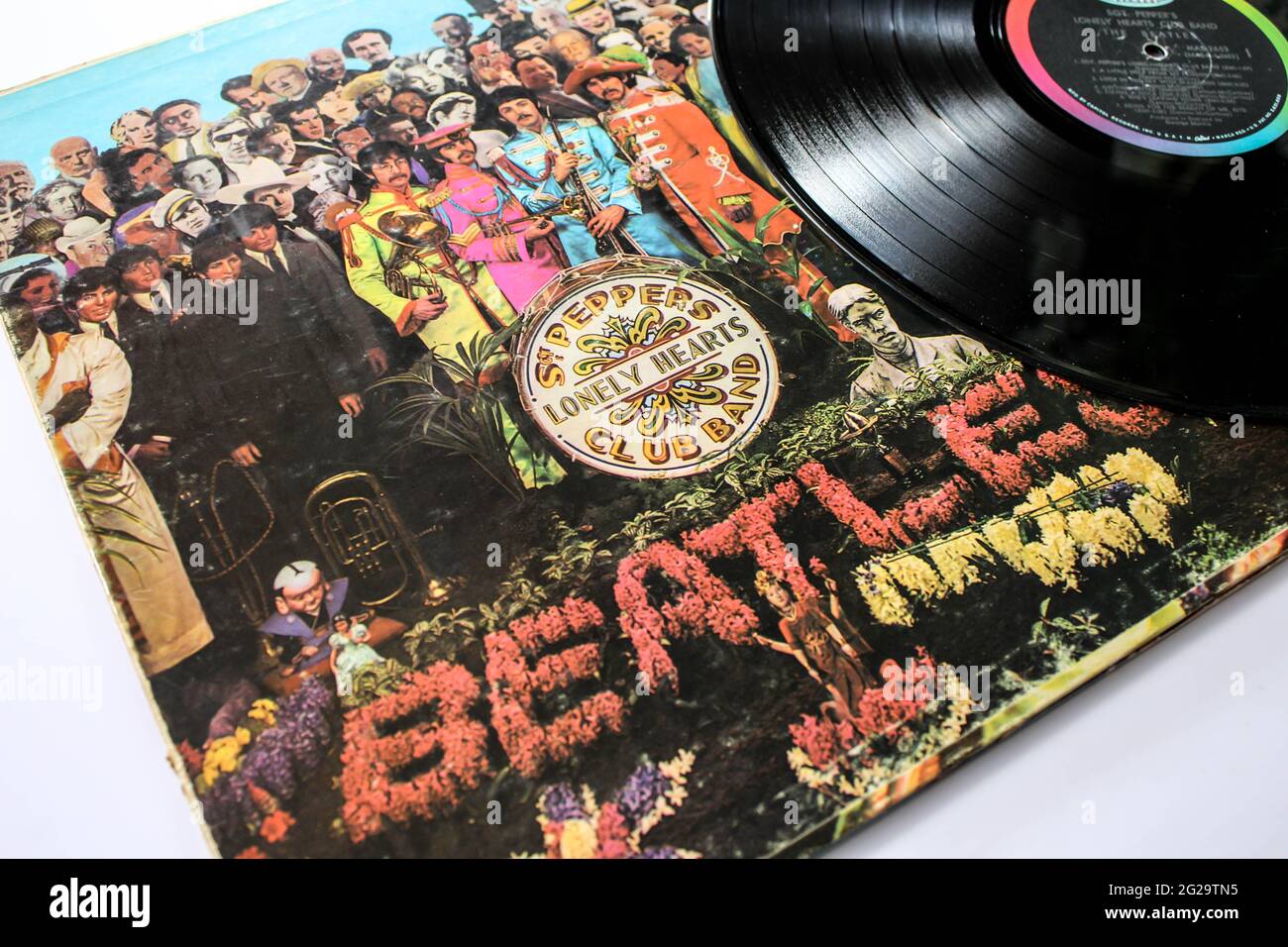 Sgt. Peppers Lonely Hearts Club Band is a record by the English rock band The Beatles. Music album is on a vinyl record LP disc. Psychedelic pop Stock Photo