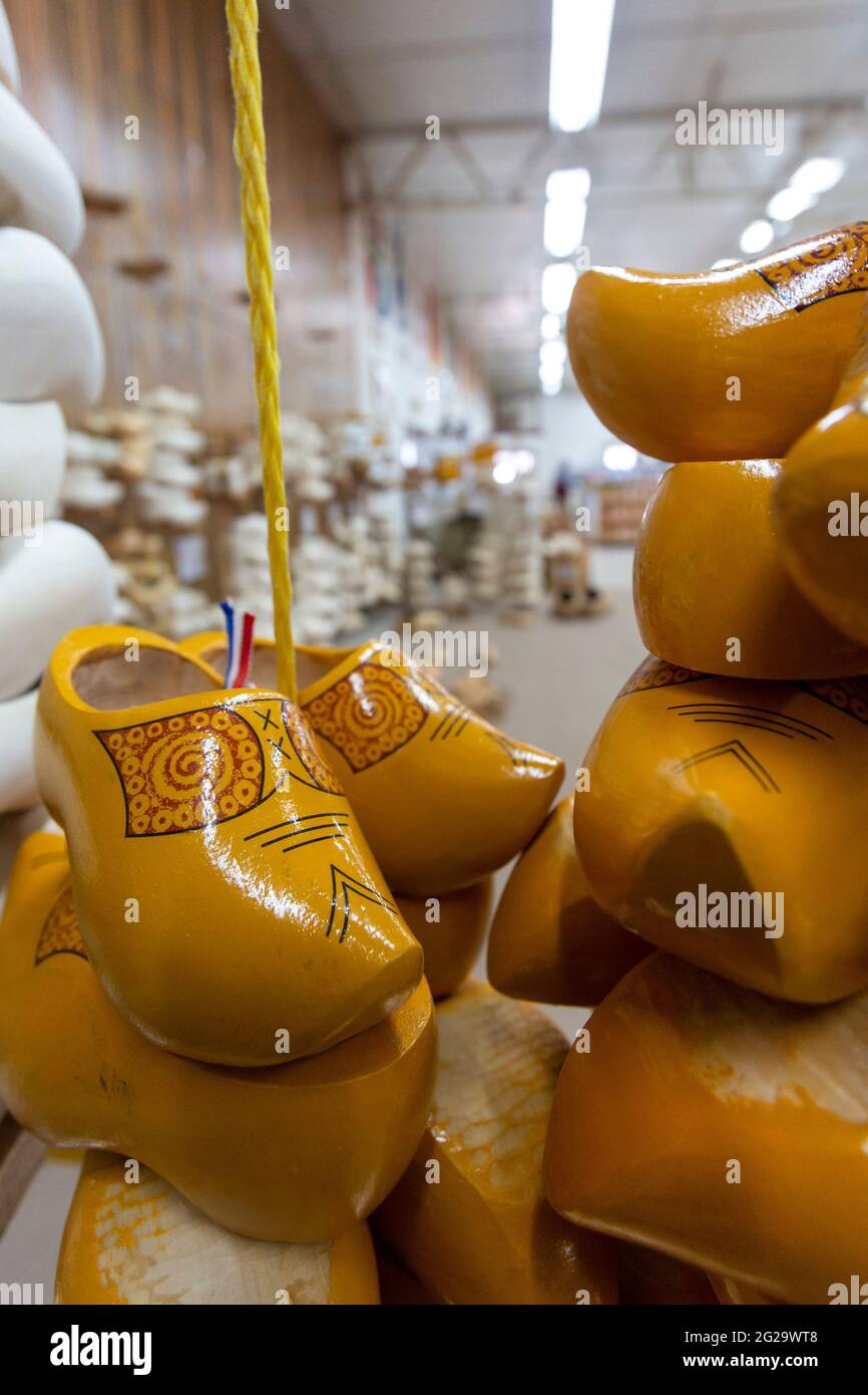 Holland, Michigan - Wooden shoes on sale at the De Klomp Wooden Shoe and Delft Factory, part of the Veldheer Tulip Farm. The city's Dutch heritage is Stock Photo