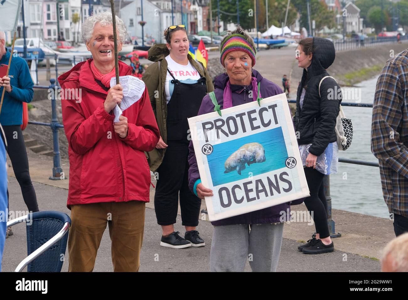 Mumbles, Swansea, UK. 9th June 2021:  Extinction Rebellion protest labelled 'Drowning in Promises' at the seaside town of Mumbles, near Swansea. Extinction Rebellion were highlighting the forthcoming G7 meeting which will be held at Carbis Bay, Cornwall on the weekend 11th to 13th June, 2021. Credit: Gareth Llewelyn/Alamy Stock Photo